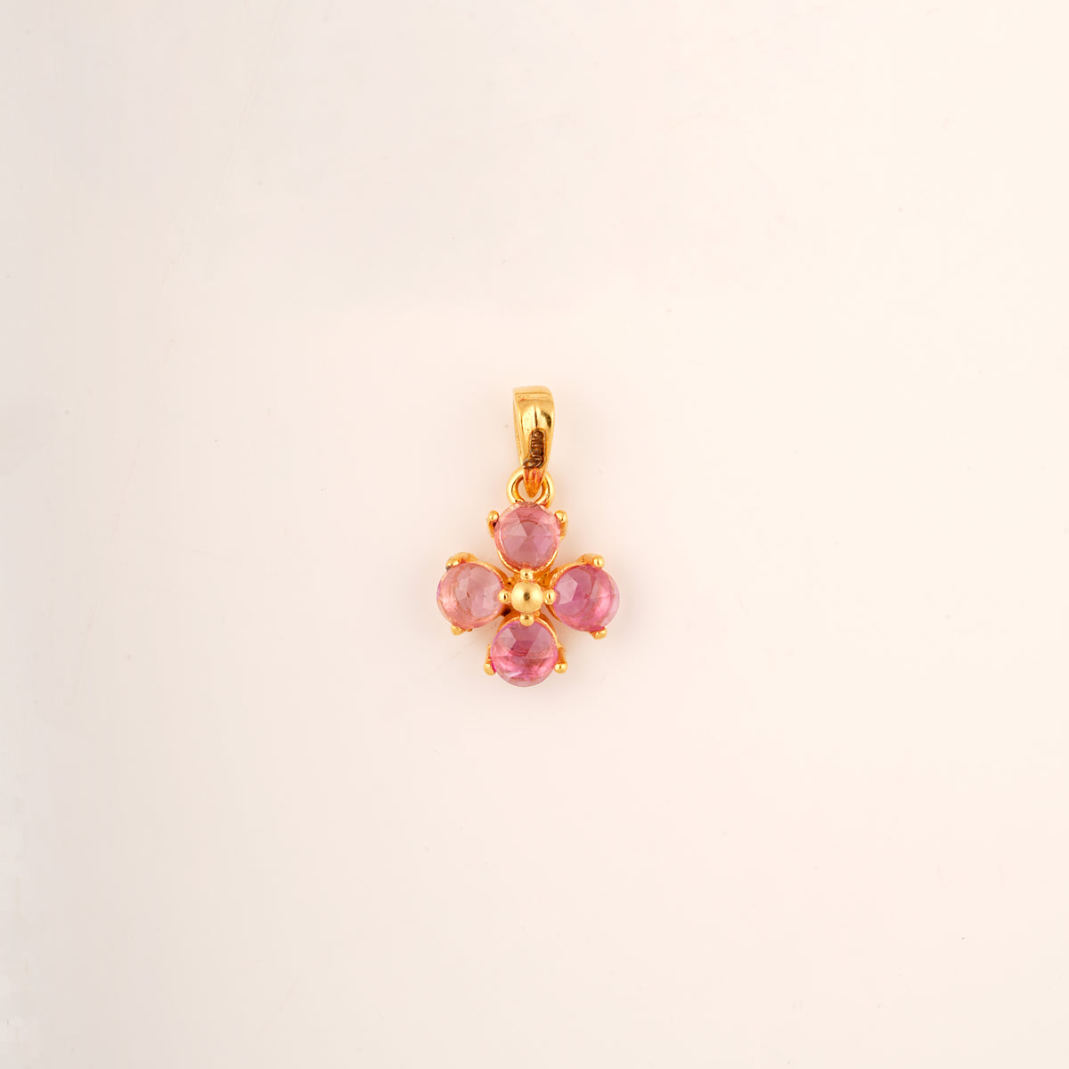 18KT gold clover pendant with pink gemstones