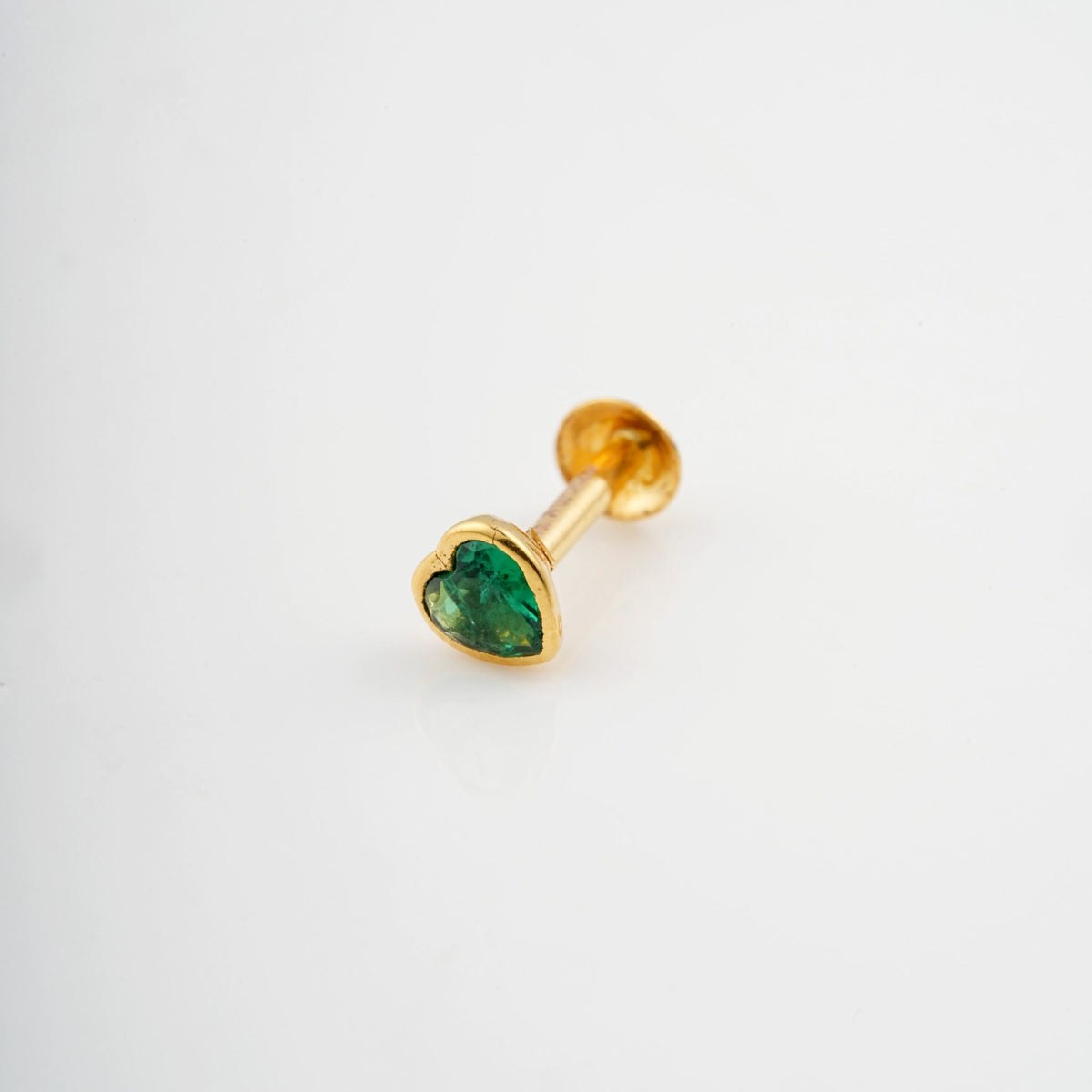 18KT gold nose pin with heart shaped green gemstone