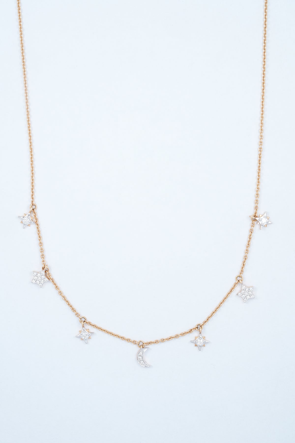 18KT rose gold diamond necklace with moon and star shaped charms