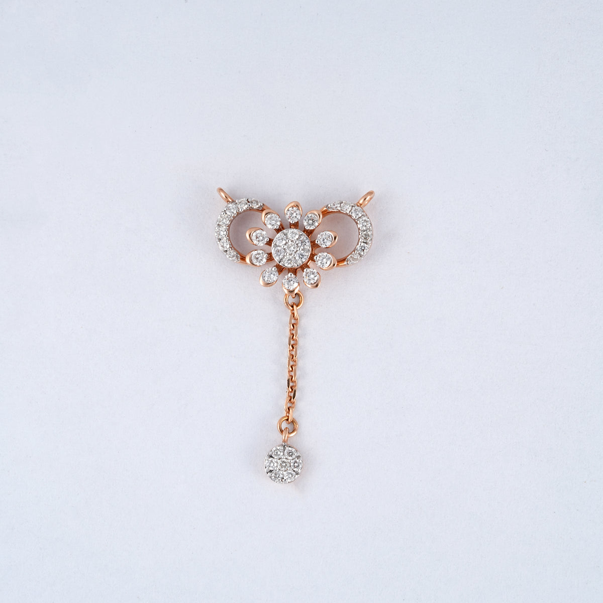 18KT rose gold diamond pendant with floral design and chain drop