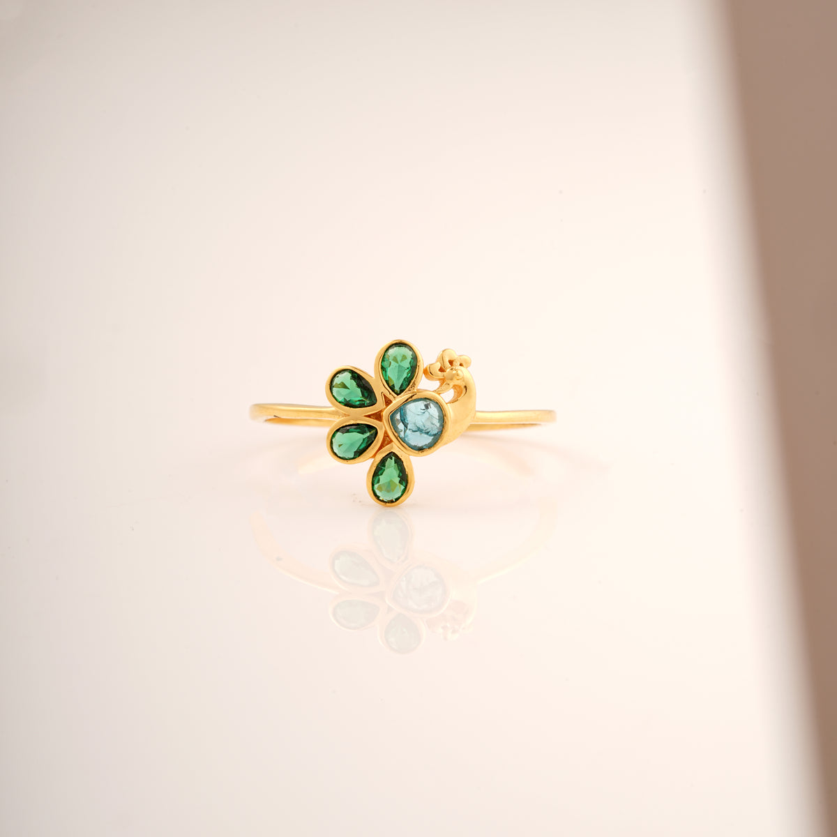 18KT gold peacock ring with green and blue gemstone flower design