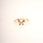 18KT gold butterfly ring with pink and blue gemstones
