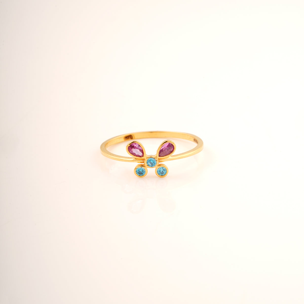 18KT gold butterfly ring with pink and blue gemstones