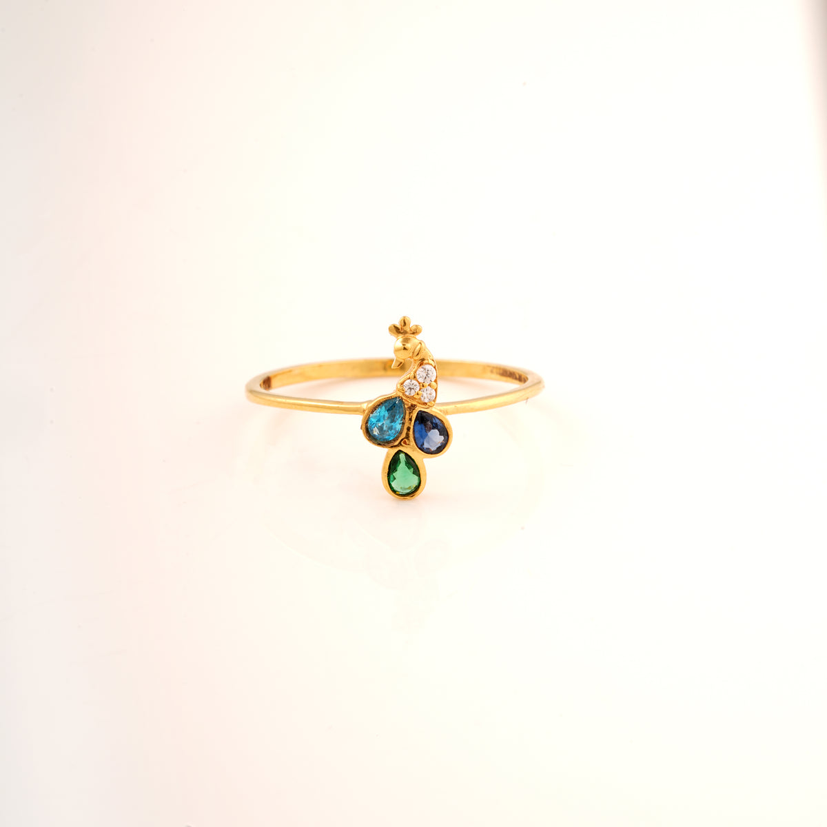 18KT gold ring with peacock design and blue and green gemstones