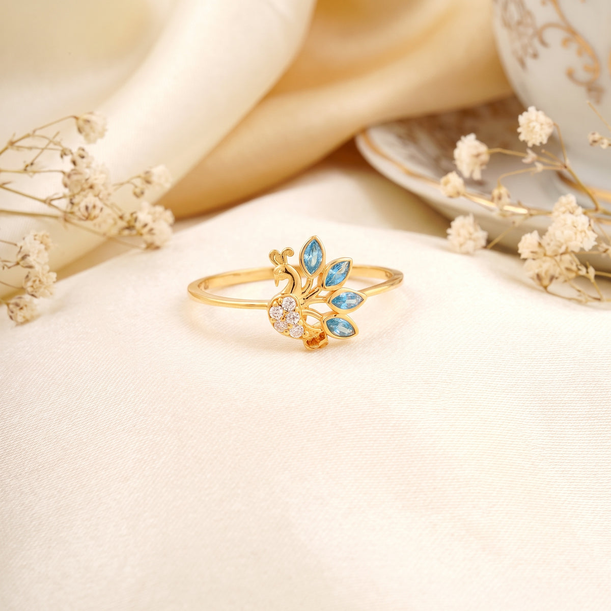 18KT Gold Ring With Peacock Feather