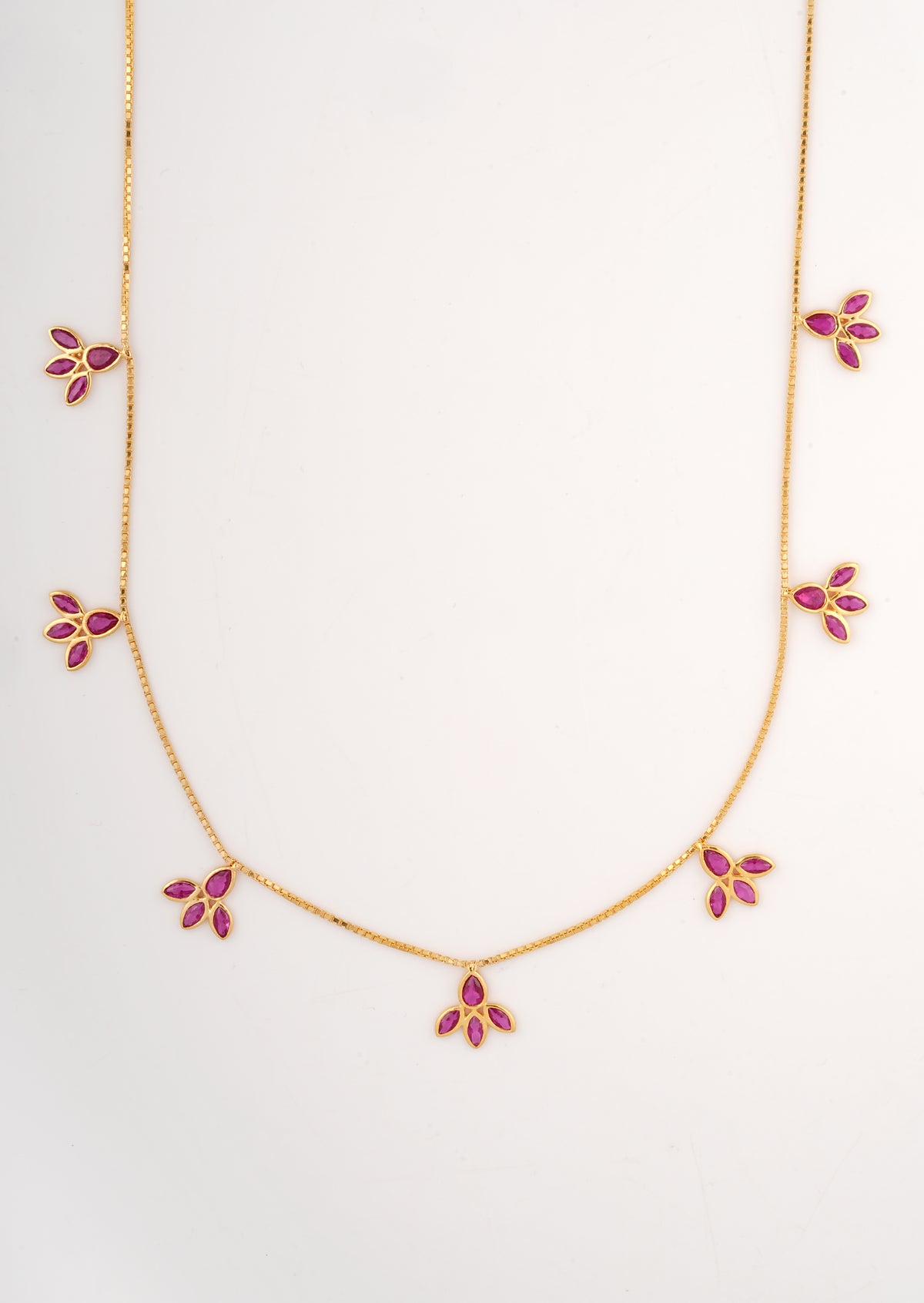 18KT gold necklace with pink gemstone leaf shaped charms