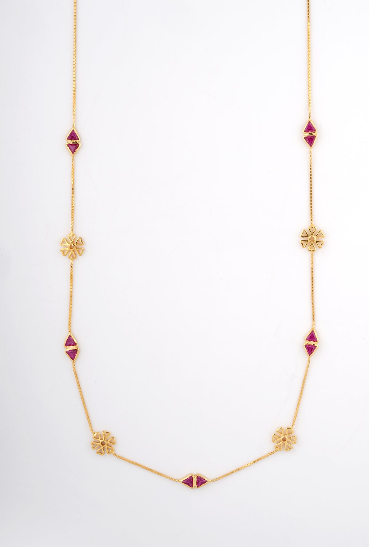 18KT gold necklace with pink gemstone stations and flower motifs