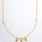 18KT gold necklace with clover motifs and pink gemstone drops