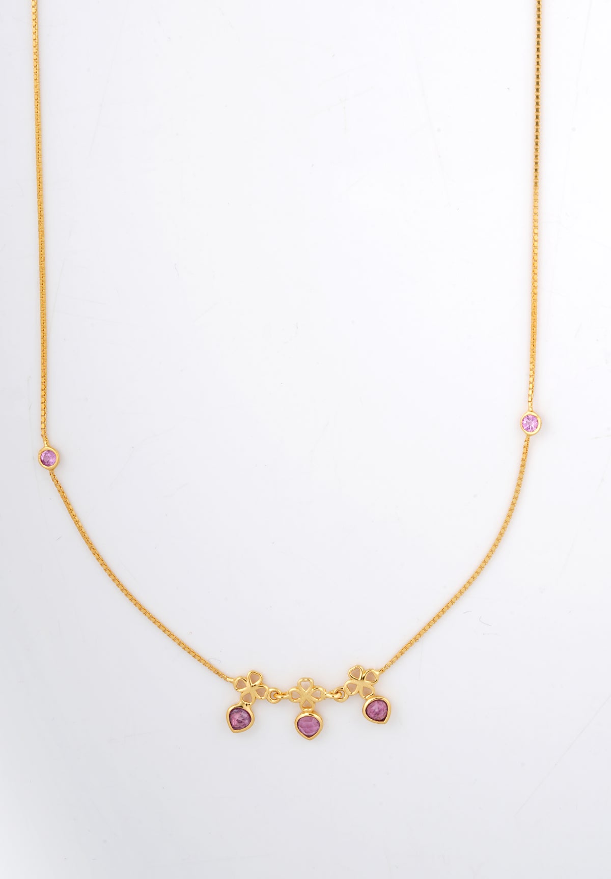 18KT gold necklace with clover motifs and pink gemstone drops