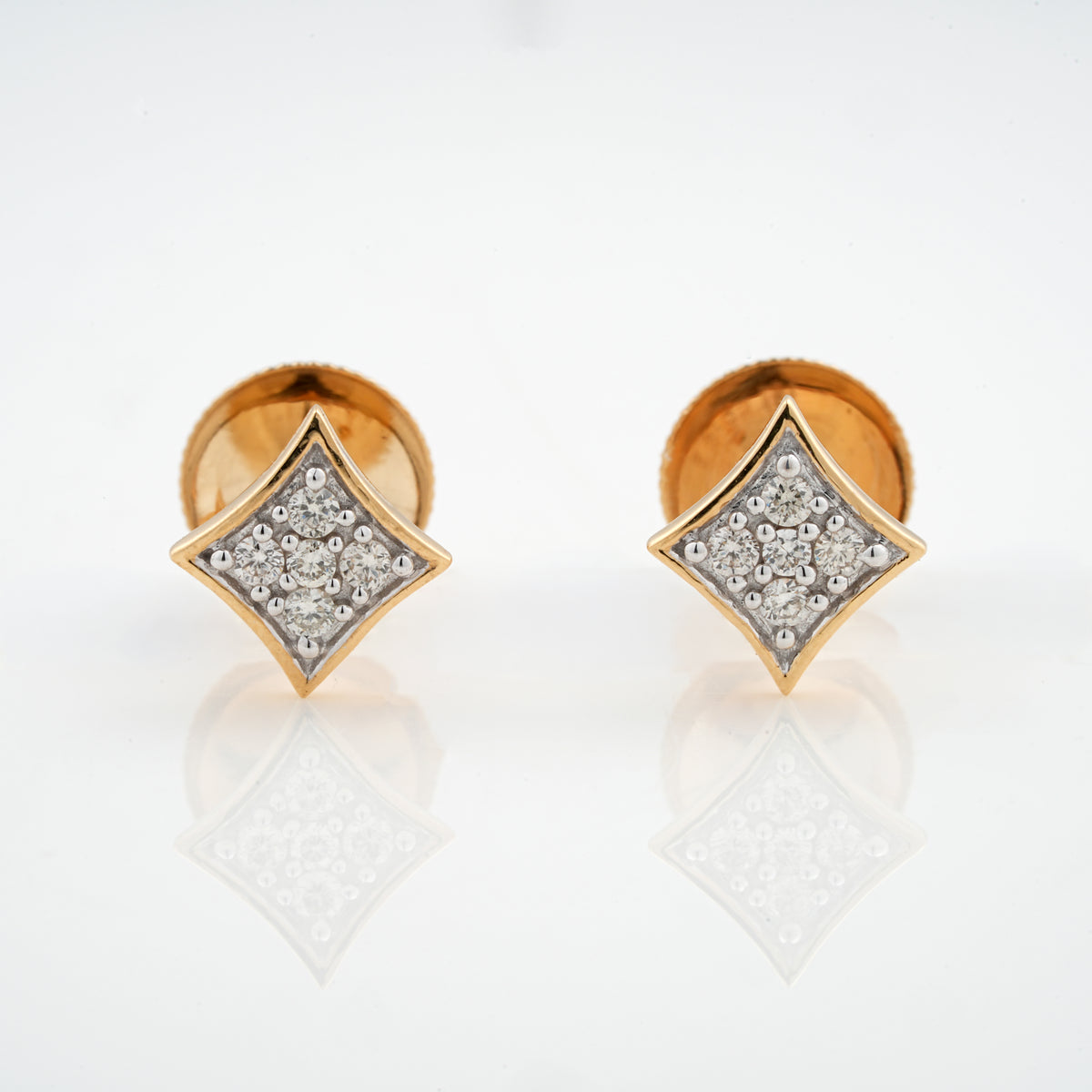 18KT gold diamond stud earrings in a kite shape