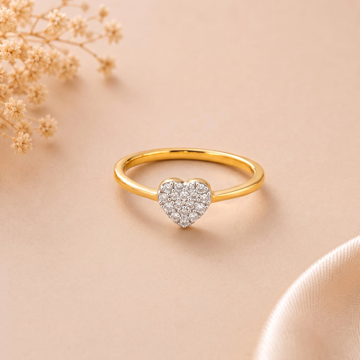 18KT gold diamond ring with pave set heart shaped design