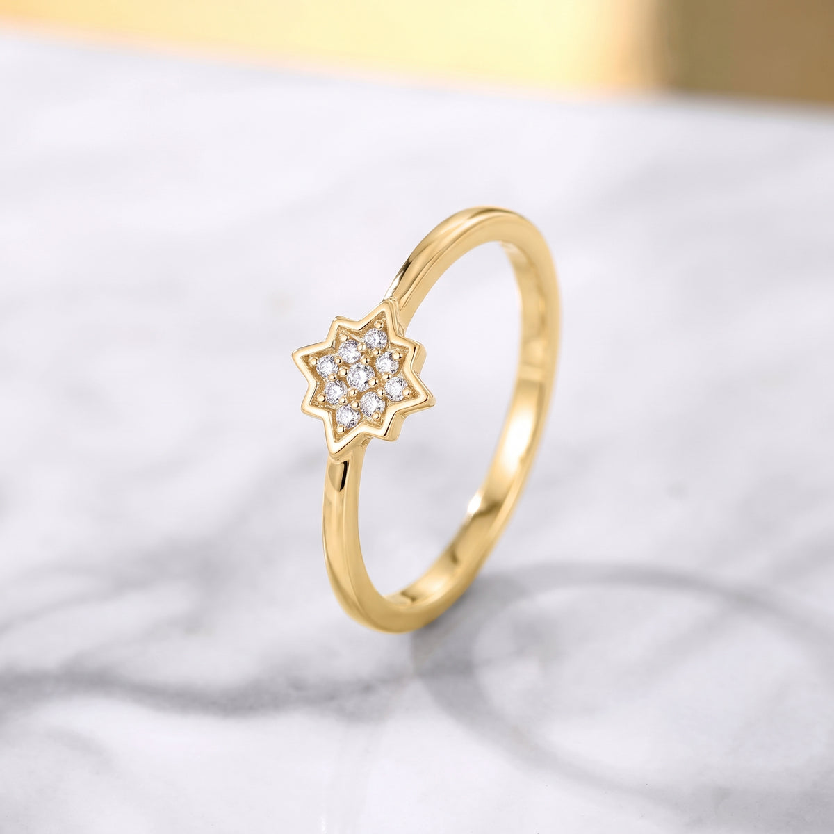 18KT gold diamond ring with star shaped cluster setting