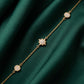 18KT gold diamond bracelet with star motif and round diamond Charms