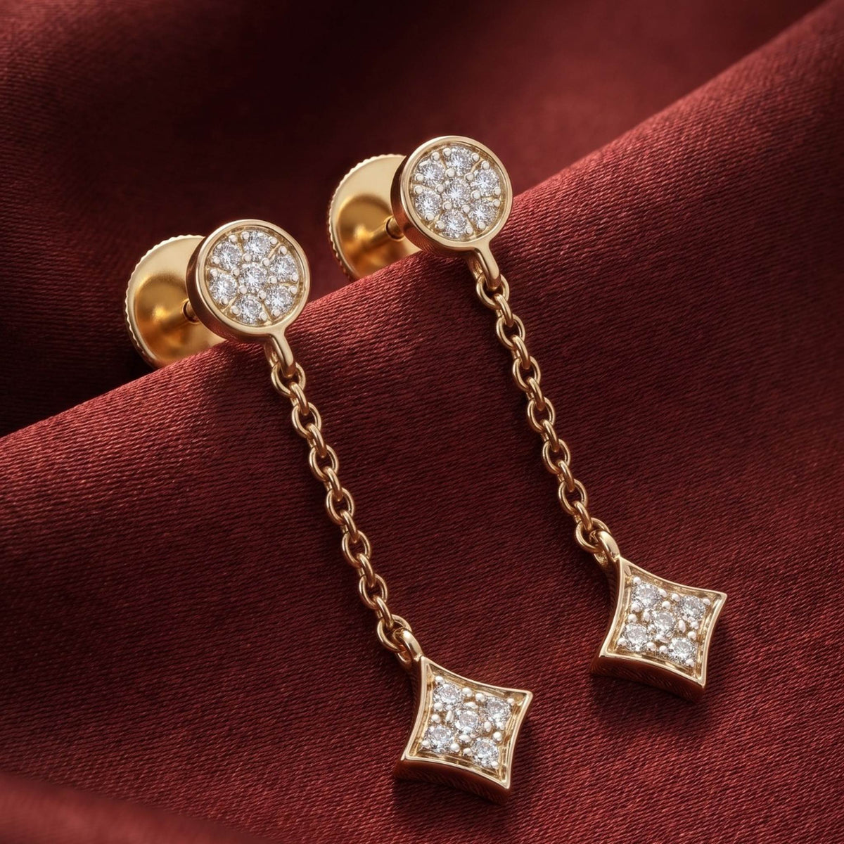 18KT gold chain drop earrings with round diamond stud and star shaped diamond charm