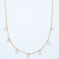 18KT rose gold diamond necklace with moon and star shaped charms