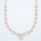 18KT rose gold diamond necklace with circle scroll link design