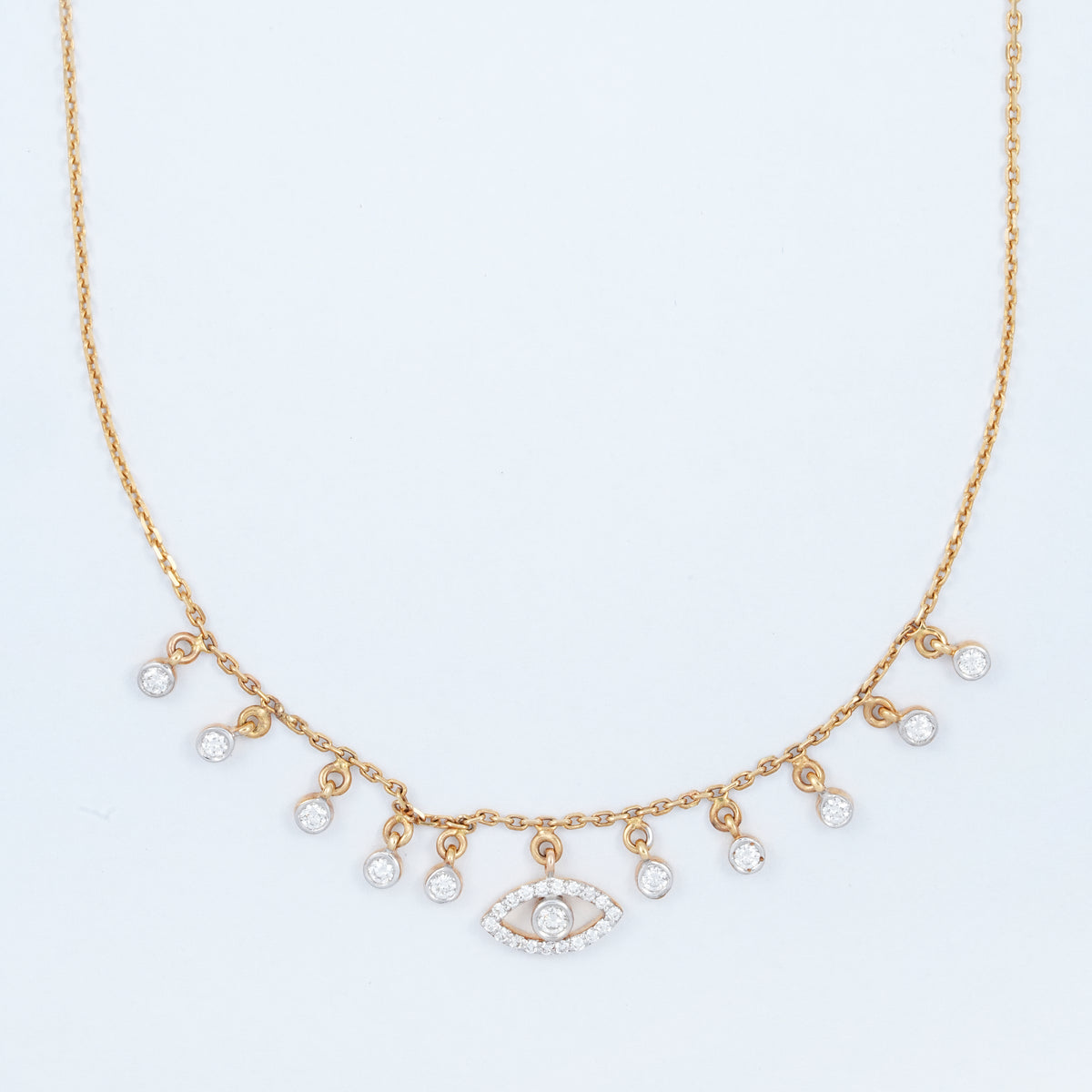 18KT gold diamond necklace with diamond drops and evil eye charm