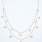 18KT rose gold diamond necklace with layered chains and fan shaped charms