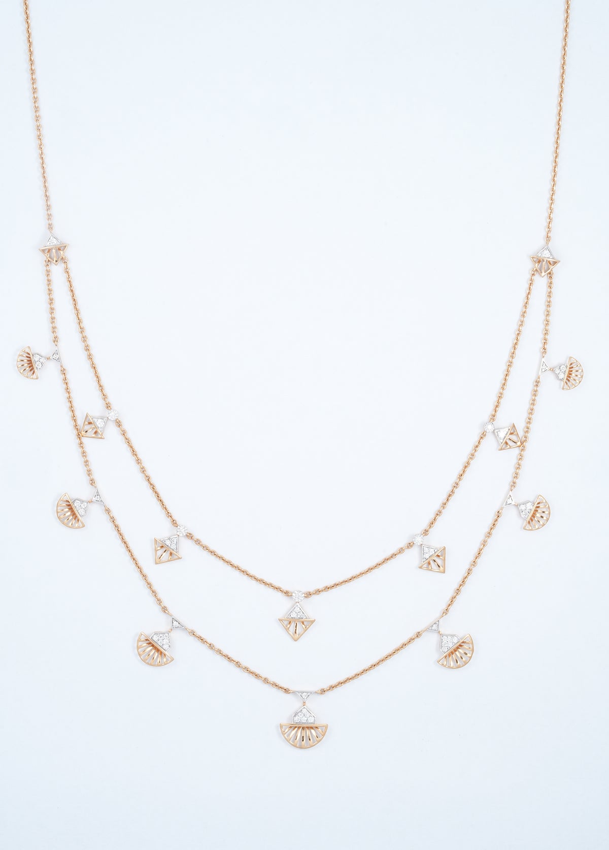 18KT rose gold diamond necklace with layered chains and fan shaped charms