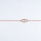 18KT rose gold bracelet with diamond leaf design in oval frame