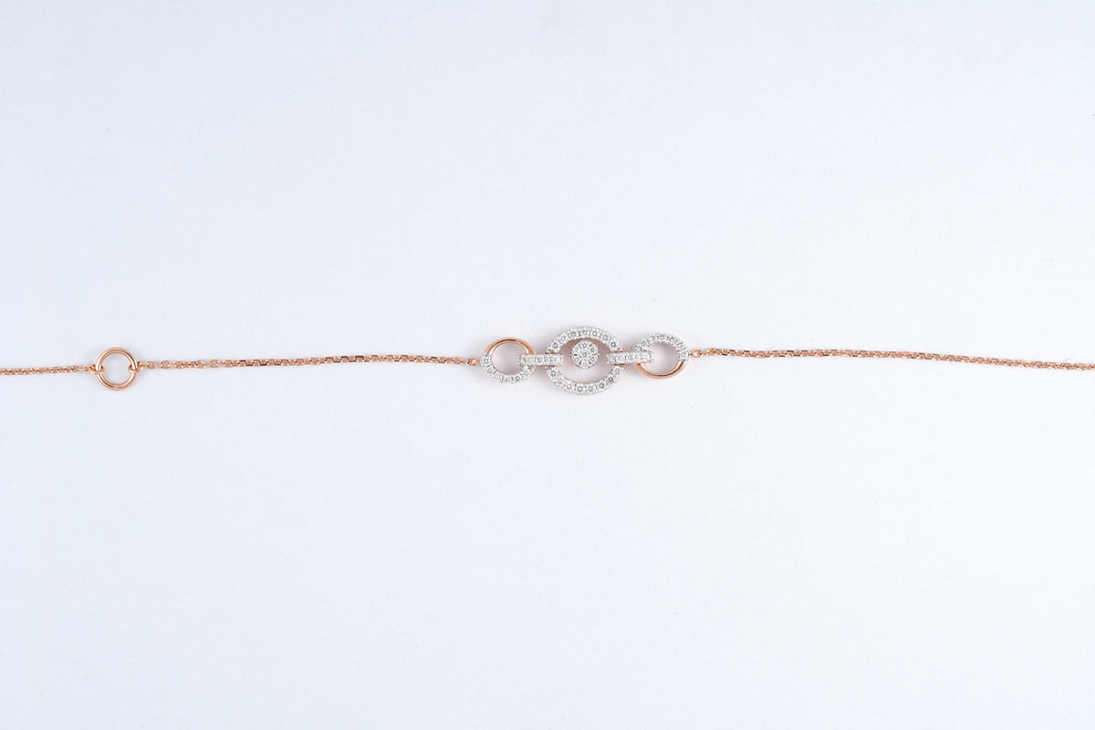 18KT rose gold bracelet with triple circle diamond link design