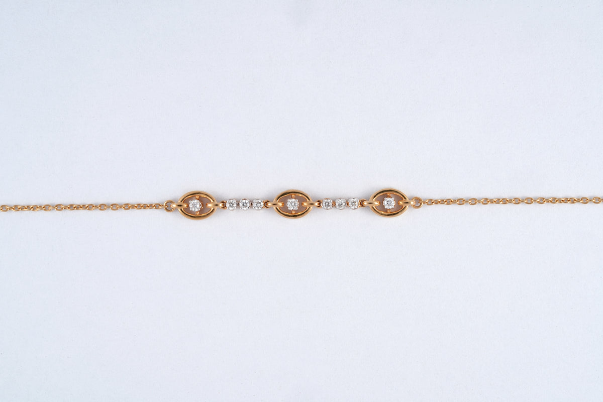 18KT rose gold bracelet with oval diamond stations