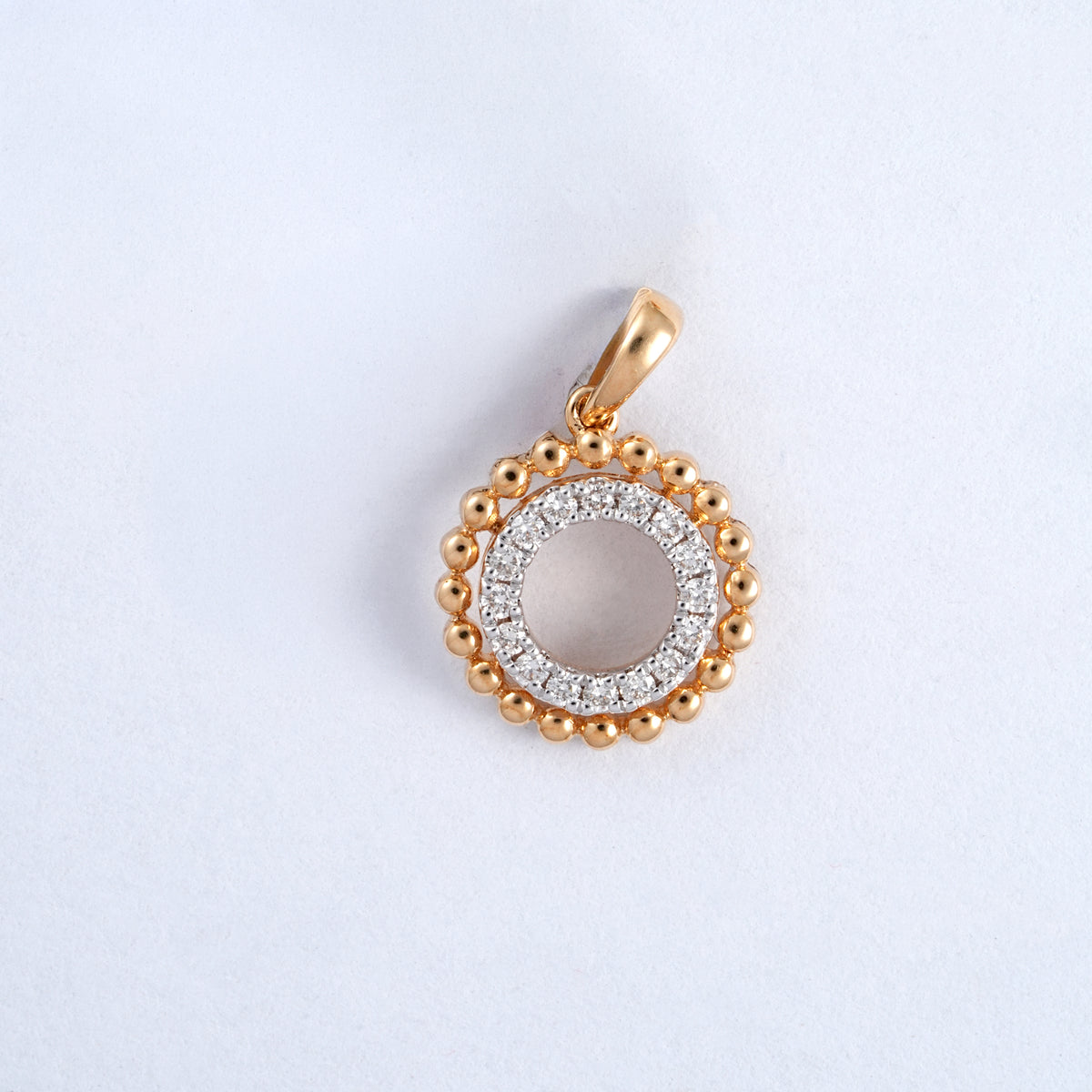18KT gold pendant with diamond circle and beaded border