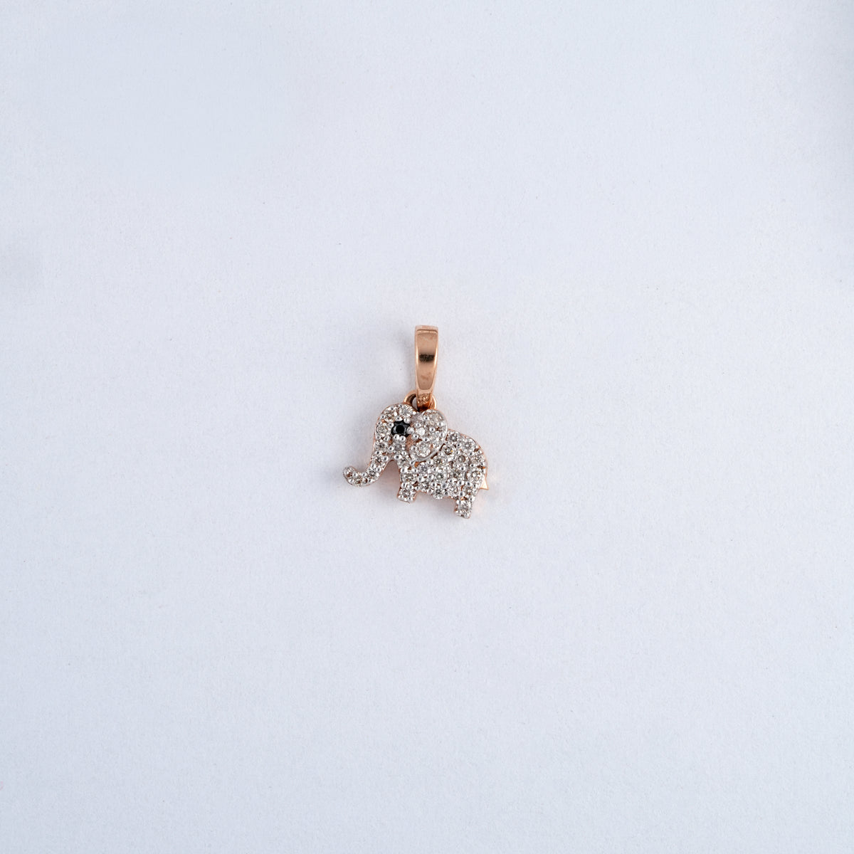 Rose gold 18KT diamond elephant pendant with black diamond eye, Lille by Challani