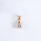18KT gold pendant with a single round diamond in claw setting