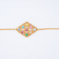 Yellow gold kite shaped bracelet with multi coloured gemstones, Lille by Challani